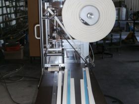 Adhesive tape application machine for fire protection strips-1