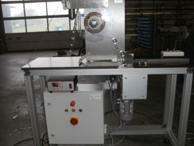Adhesive tape application machine for heat-activated adhesive tape